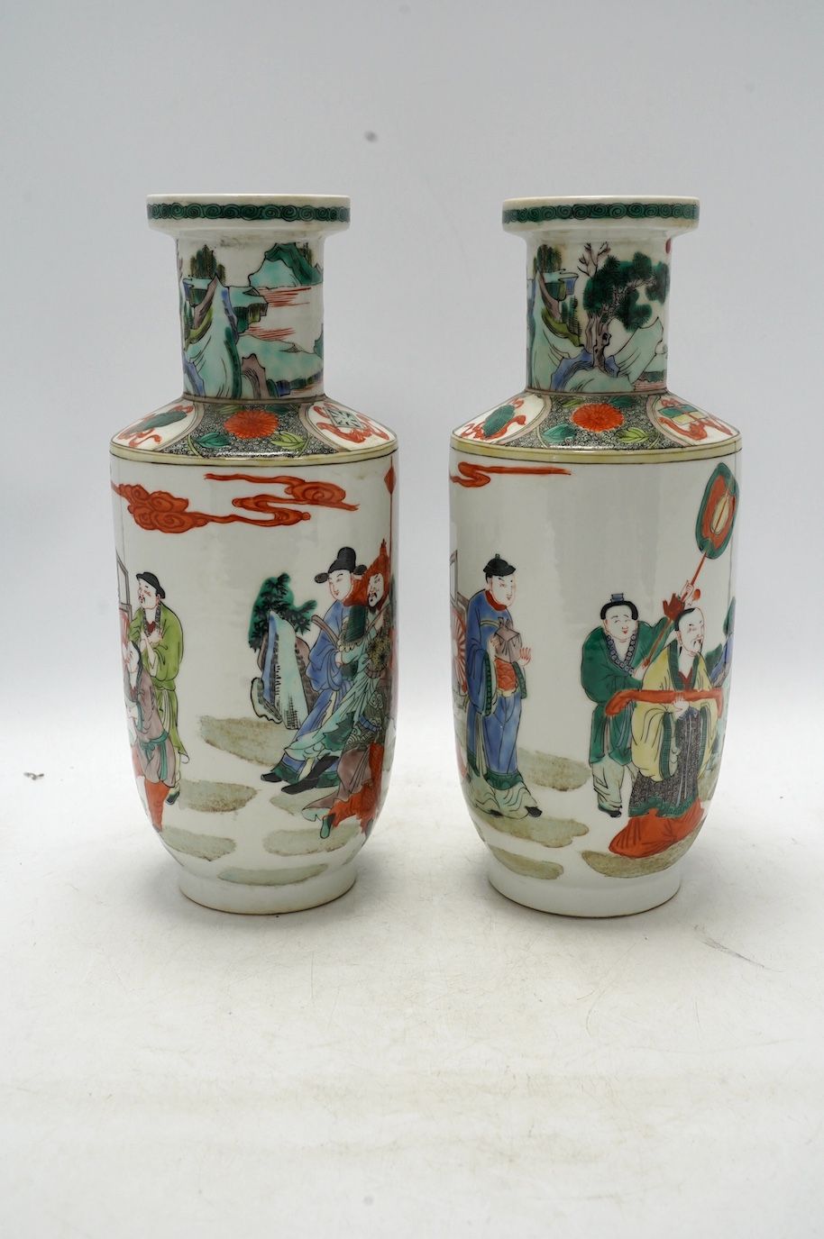 A pair of Chinese famille verte vases, hand painted with figures, 32cm high. Condition - good